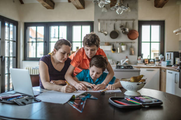 istock Mother homeschooling boys from home 1223237135