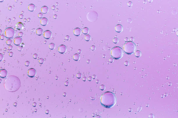 istock Abstract molecule sctructure. Water bubbles. Macro shot of air or molecule. Abstract pink and orange red background. Space or planets abstract background. Selective focus 1223239161