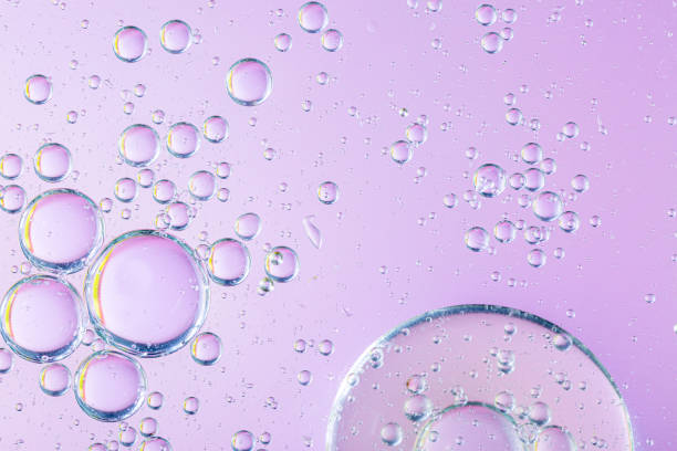 istock Abstract molecule sctructure. Water bubbles. Macro shot of air or molecule. Abstract pink and orange red background. Space or planets abstract background. Selective focus 1223239256