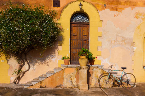 istock Classic, common Sicilian doorway with bicycle 1223239585