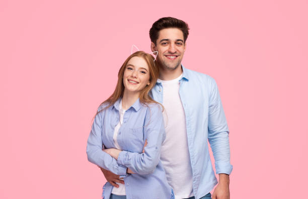 istock Young couple hugging and smiling for camera 1223240258