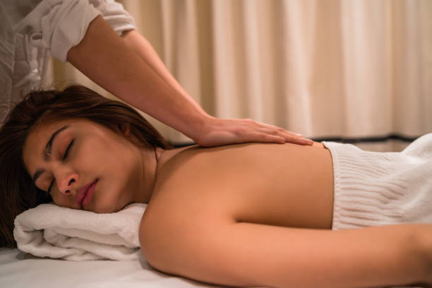 istock Young woman relaxing in the spa. 1223240981