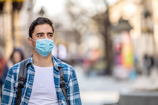 istock Student wearing a mask due to high pollution 1223241985
