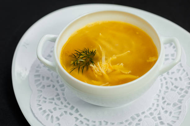 istock hot noodle soup with chicken and broth on a white plate 1223242426