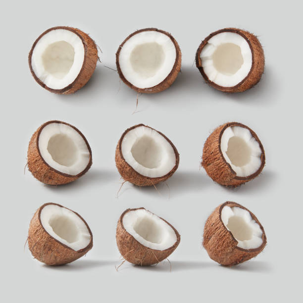 istock Fresh ripe tropical coconut fruits pattern on a light grey background 1223242553