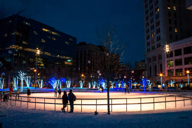 Ice skating at Rosa Parks Circle in Grand Rapids Michigan during the holiday stock photo