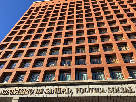 Madrid, Spain - February 23, 2020: Low angle view of the governent building hosting the ministry of sanitation and social policies in the city downtown. This area of the government takes care of all health and social issues in the country