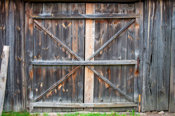 istock Old wooden barn facade with big gate 1223245807
