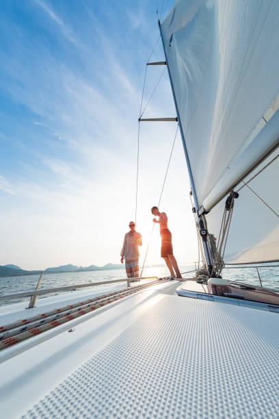 istock Young couple sailing on the boat 1223250482