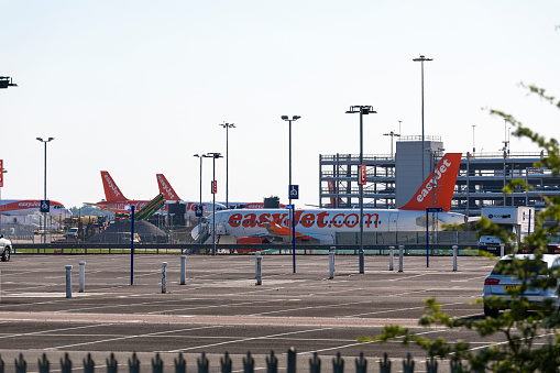 6th May, 2020 - Luton, UK: Grounded Easyjet planes during the Corona Virus Pandemic at Luton Airport. EasyJet have ceased most of their flights during the pandemic and their planes are parked up at the airport.
