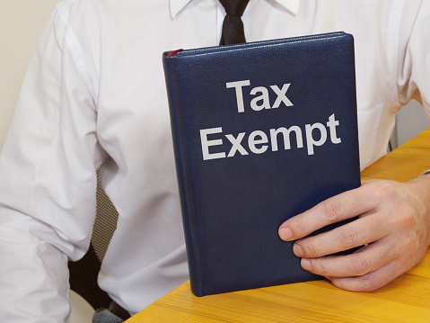 Tax Exempt is shown on the conceptual business photo