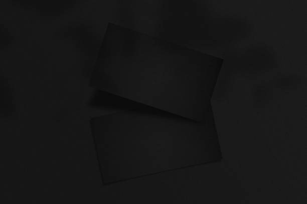 istock Clean minimal business card mockup with black background. 1223253439