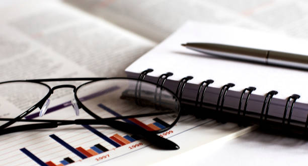 istock Teamwork with business people analysis cost graph on desk at meeting room. 1223254617