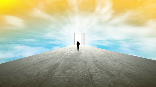 istock Business man walking towards a door. Better future. Sky. Sunset. 1223254973