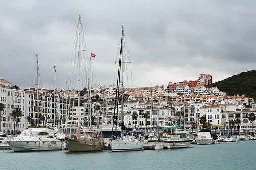 La Linea de la Conception, Spain - February 11, 2016: Colour photograph of boats and apartements in a Marina In La Linea De Conception oposite Gibraltar.