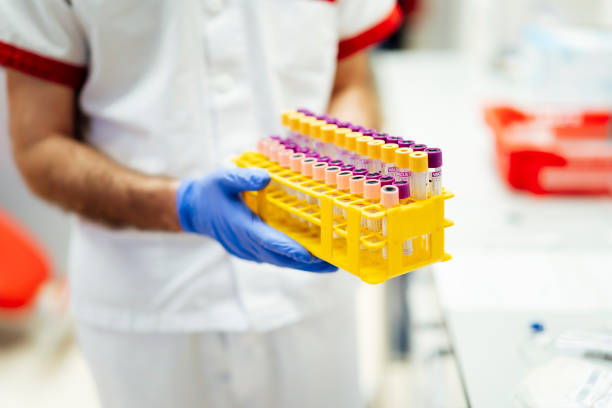 istock doctor preparing material to perform the covid19 screening test 1223256158