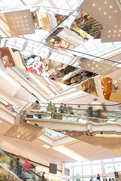 istock Blurred Motion of Shoppers on Escalators 122326083