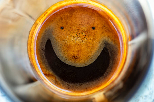 A foamy coffee with a smile