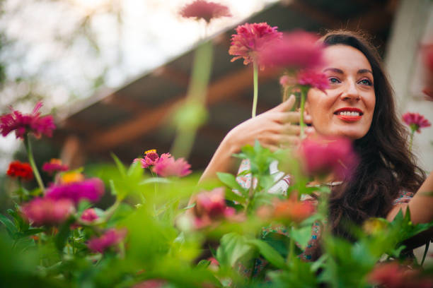 istock Romantic lady in the flowers garden 1223262485