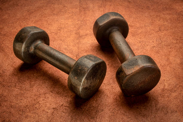istock old rusty dumbbells - fitness concept 1223263505