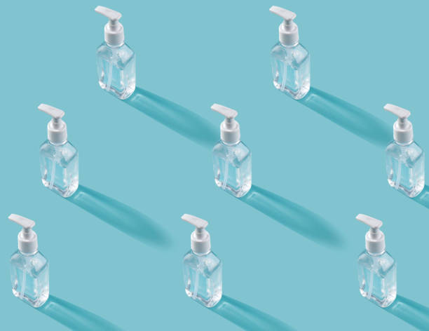 istock Trendy pattern with mask and antiseptic on a blue background 1223263866