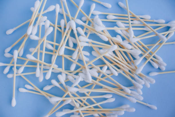 istock Top view on bamboo cotton sticks on blue background. Copyspace for your design, zero waste concept 1223264710