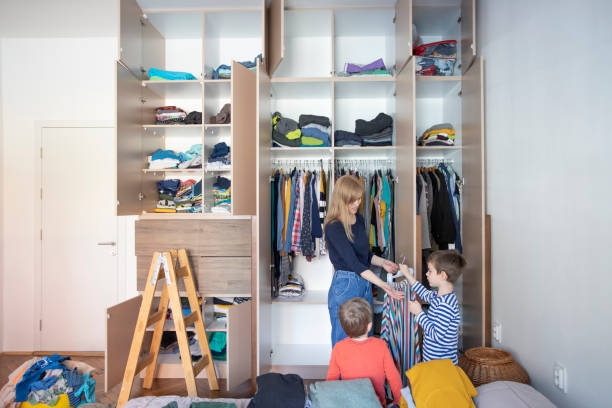 istock Arranging wardrobe with kids 1223266107