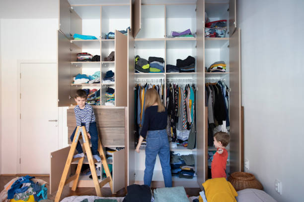 istock Arranging wardrobe with kids 1223266140
