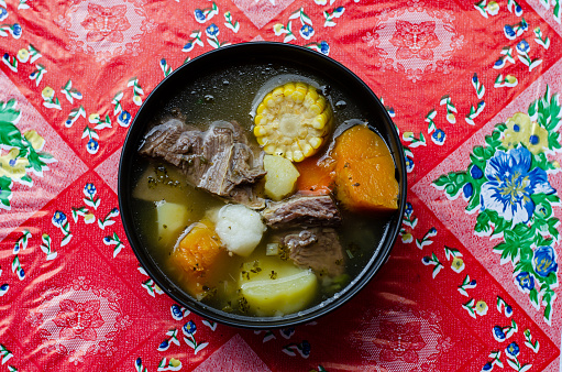 Panamanian style meat soup is made with a variety of vegetables and condiments