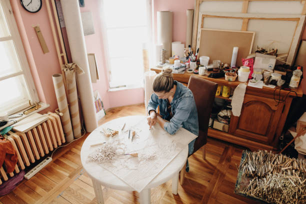 istock Perspective artist working on new linocut at home during lockdown 1223266795