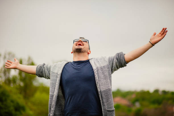 istock Handsome man is smiling in the countryside 1223268235