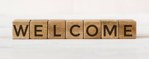 istock Word WELCOME written on wooden cubes on white background. 1223269762