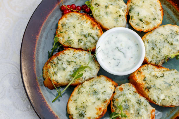 istock garlic bread with raw greens and sauce on a decorated table 1223270405