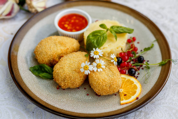 istock chicken nuggets with mashed potatoes and sauce 1223270445