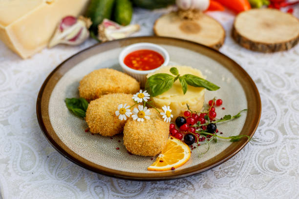 istock chicken nuggets with mashed potatoes and sauce 1223270473