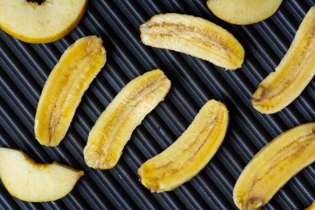 Sliced banana fruit on the grill top view