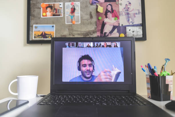 istock Attending to an online class in a video conference with teacher and students 1223276484