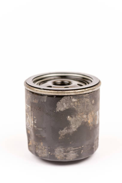 istock Old used car oil filter isolated over white background 1223276525