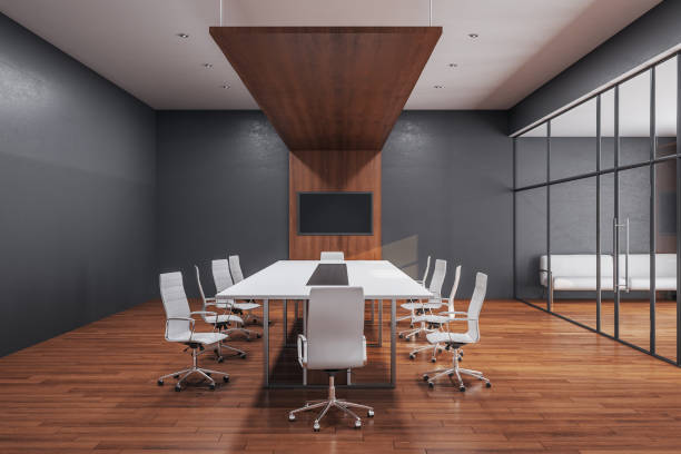 istock Luxury conference room interior with blank tv screen 1223277440