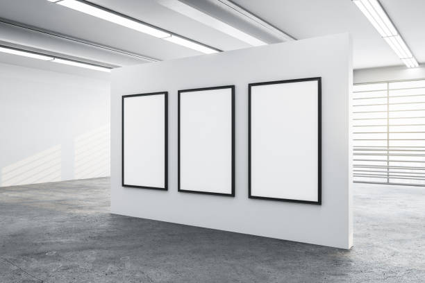 istock Three blank big mock up poster on white wall 1223277500