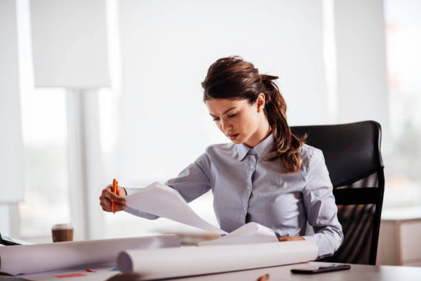 istock Young woman working on a project stock photo 1223277776