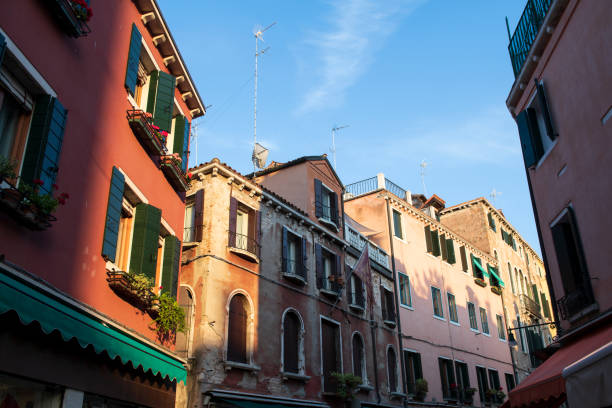 Venice, Italy - June 7th 2024:  Venetian skyline with old palaces and church towers seen from a vaporetto