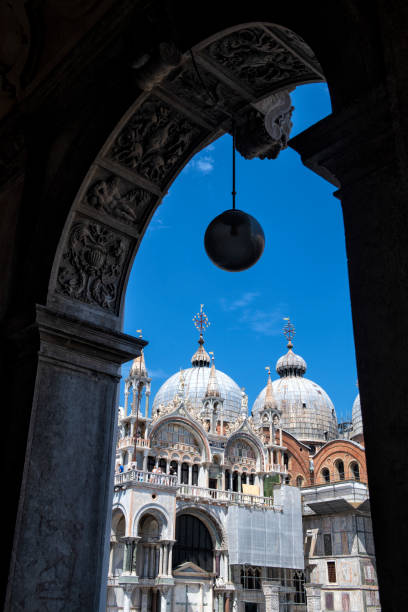 istock View of St Mark's Basilica through arched door in Venice 1223280077