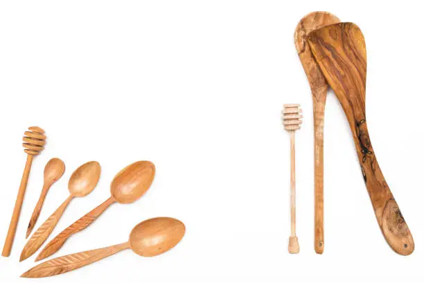 Houseware: wooden kitchen utensils, isolated on white background top view. Zero waste, eco friendly concept. Flat lay.