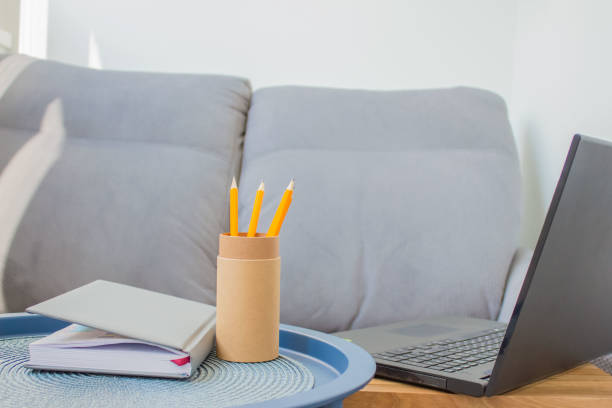 istock Home office of creative entrepreneur with black laptop 1223285455
