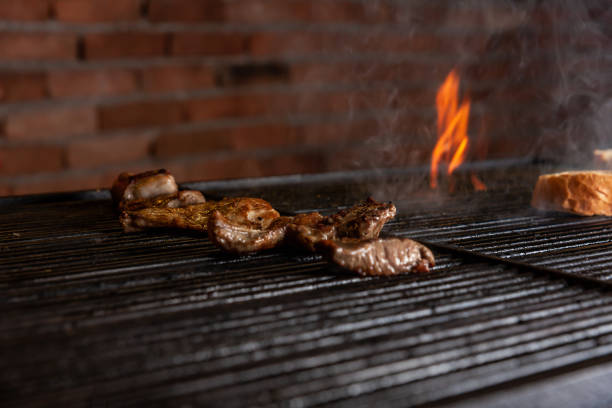 istock delicious meats cooking on the grill 1223292543