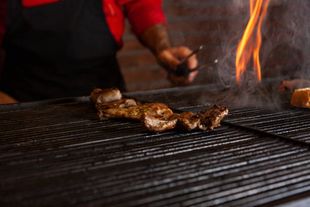 istock delicious meats cooking on the grill 1223292700