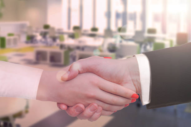 istock Business and office concept - businessman shaking hands each other 1223293355