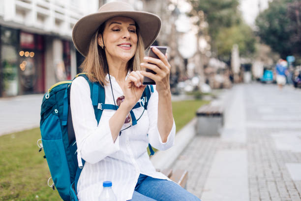 istock Modern woman holding the smartphone 1223296074