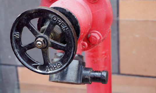 Close-up of a wheel handle of valve in fire fighting system,Industrial safety concept